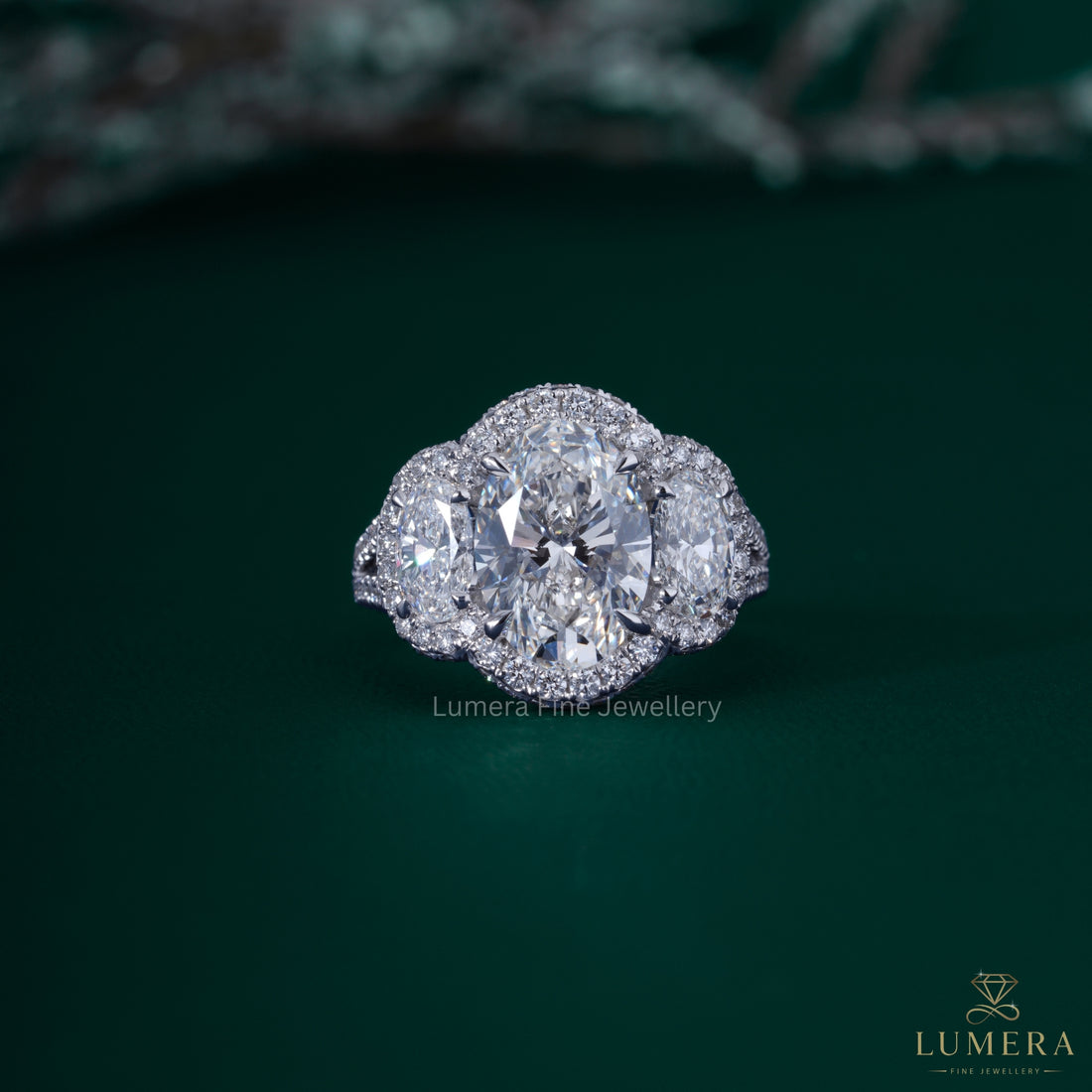 3 stone engagement ring with Three stone oval diamond ring.