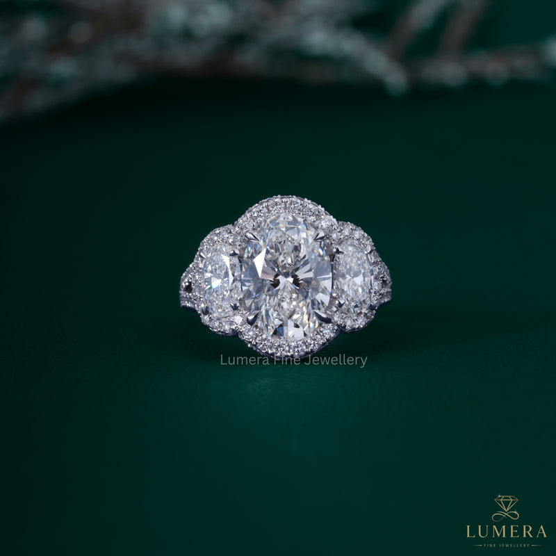 Oval Cut Halo 3 Stone Engagement Ring With Split Shank Pave