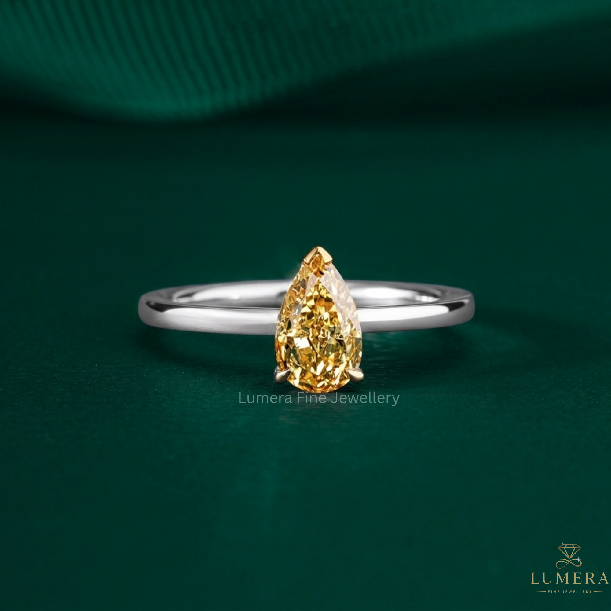 solitaire diamond engagement ring with pear engagement ring.
