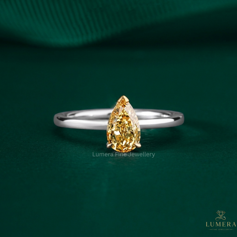 solitaire diamond engagement ring with pear engagement ring.
