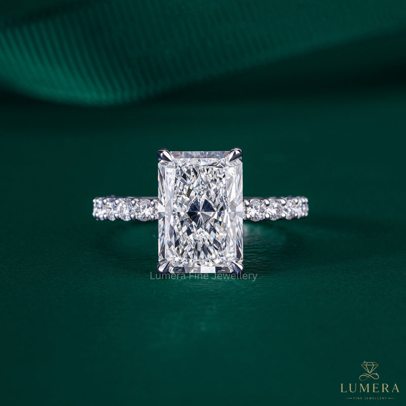hidden halo engagement ring with U prong pave band.