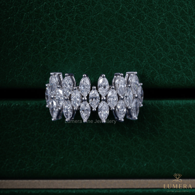 marquise diamond wedding band with three row pave band.

