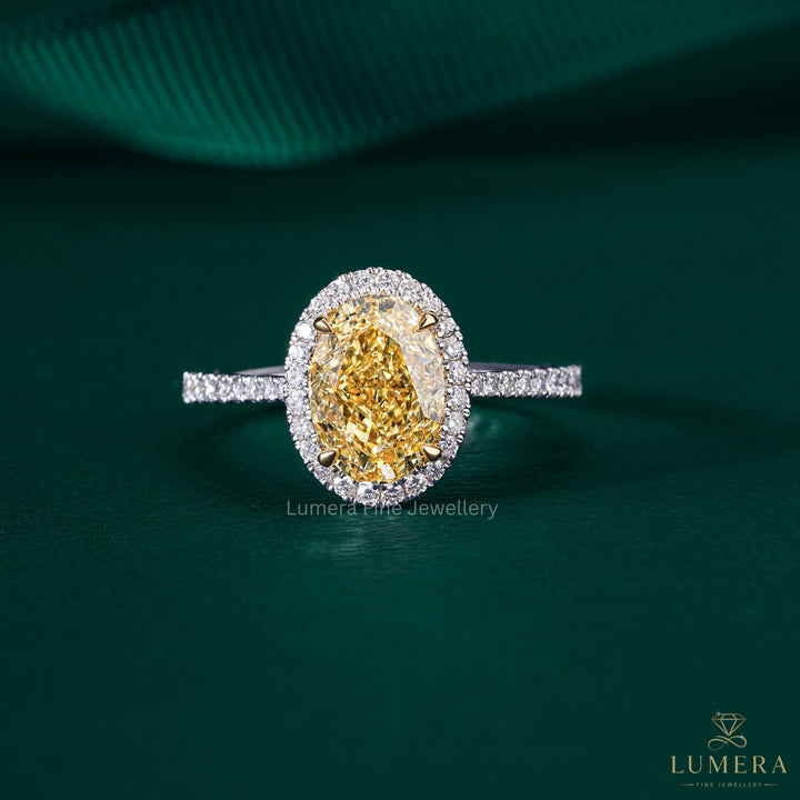 oval yellow diamond ring with oval halo diamond ring.