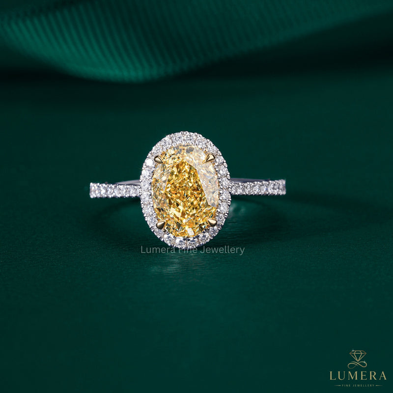 oval yellow diamond ring with oval halo diamond ring.