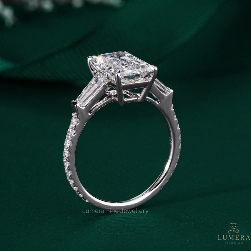 emerald cut engagement ring with emerald diamond ring.
