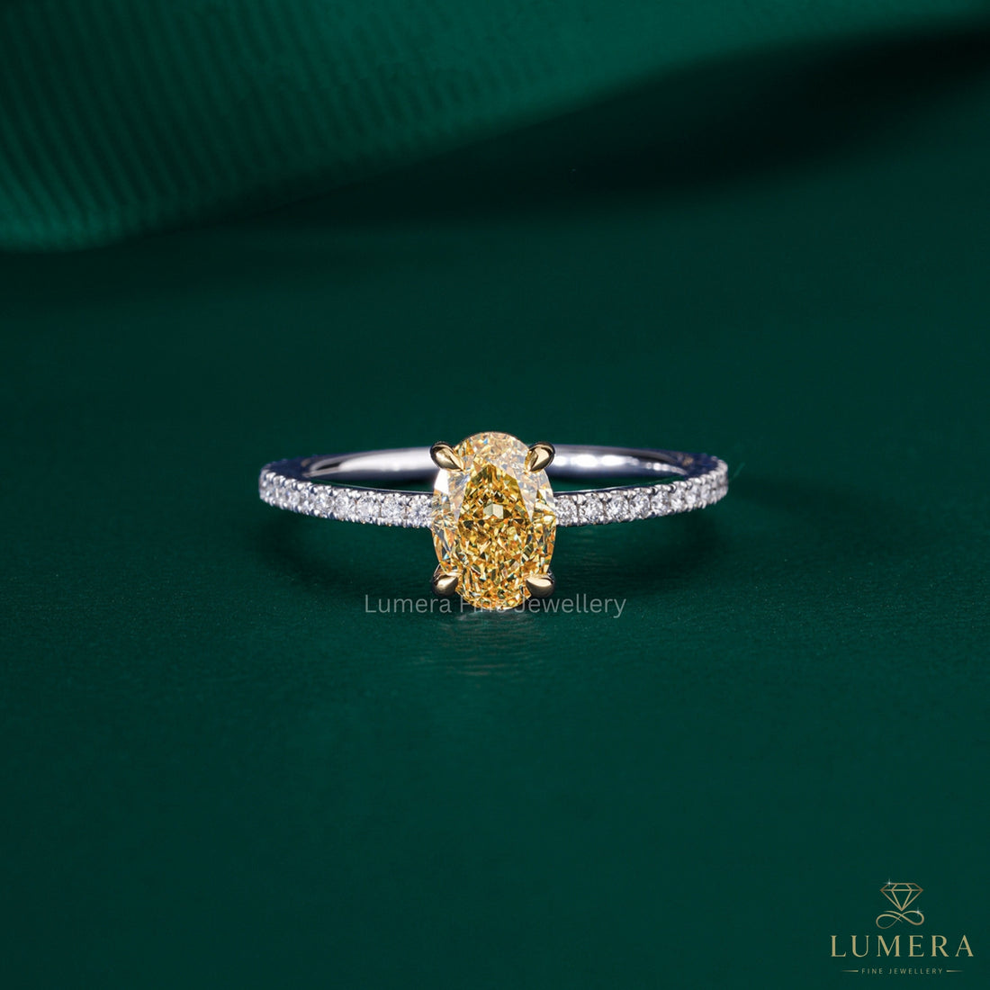 oval diamond ring with yellow diamond engagement ring.