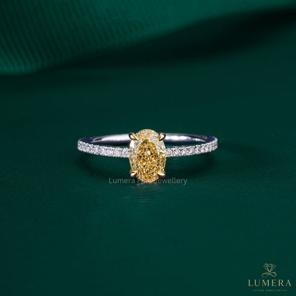 oval diamond ring with yellow diamond engagement ring.
