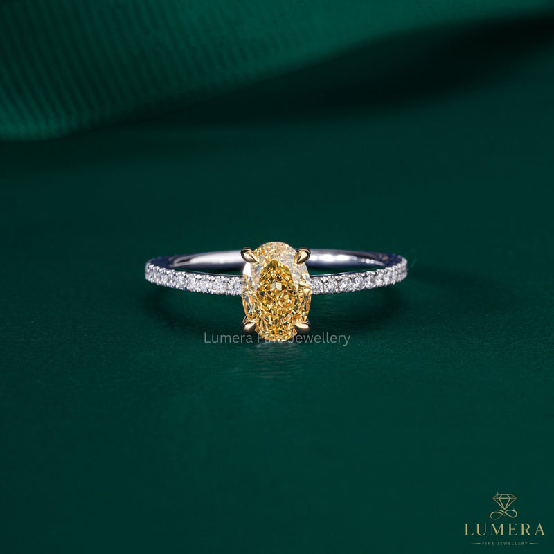oval diamond ring with yellow diamond engagement ring.