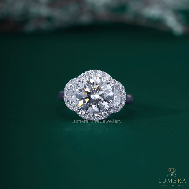 Round Cut Diamond Engagement Ring In Half Moon Side Stone