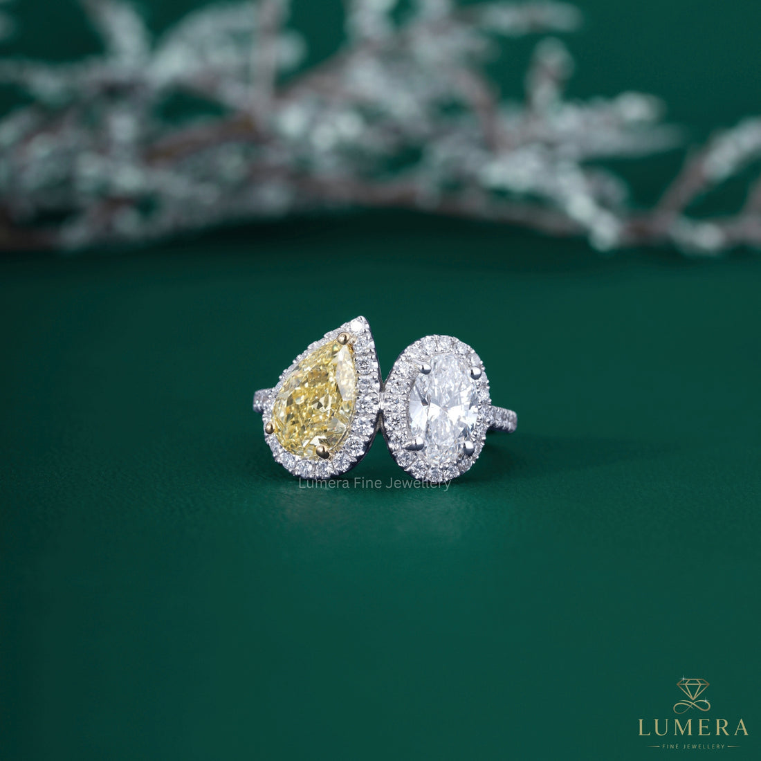 Yellow Pear Shaped Engagement Ring with yellow diamond engagement ring.
