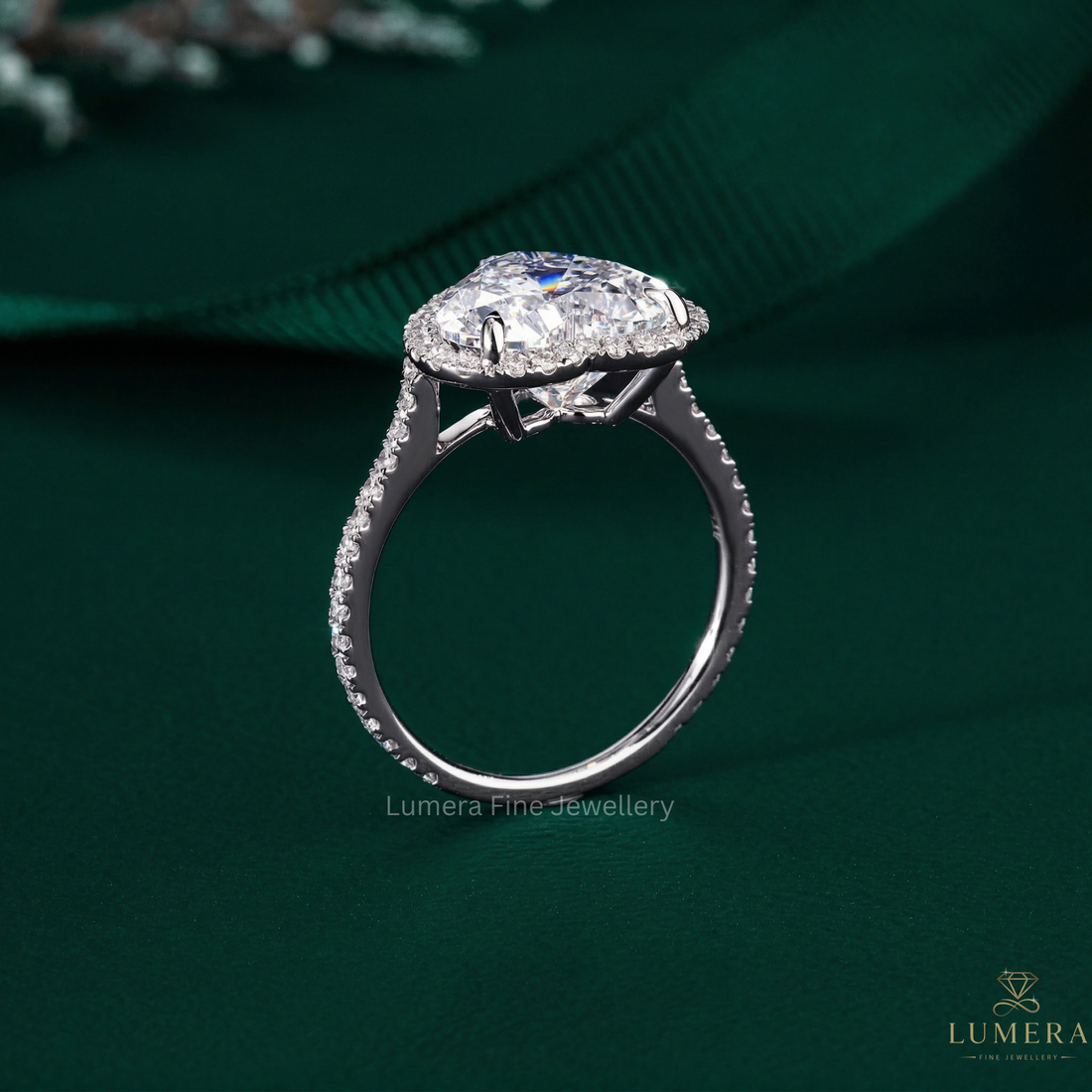 heart shaped diamond engagement ring with cathedral setting ring.