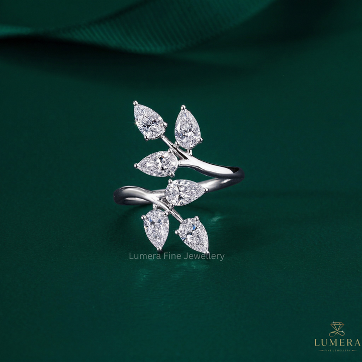 bypass engagement ring with pear shape diamond ring.
