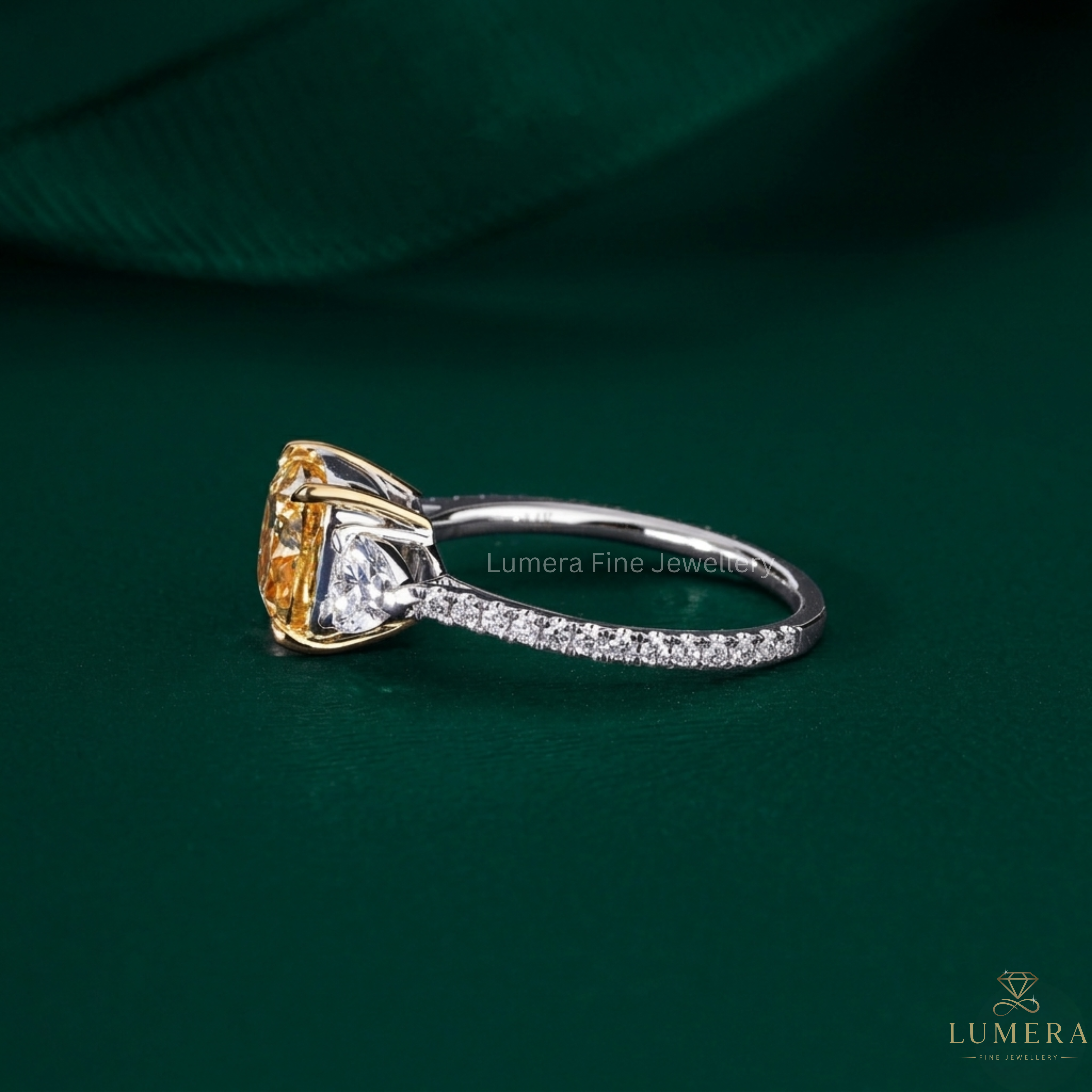 yellow diamond ring with cushion ring.

