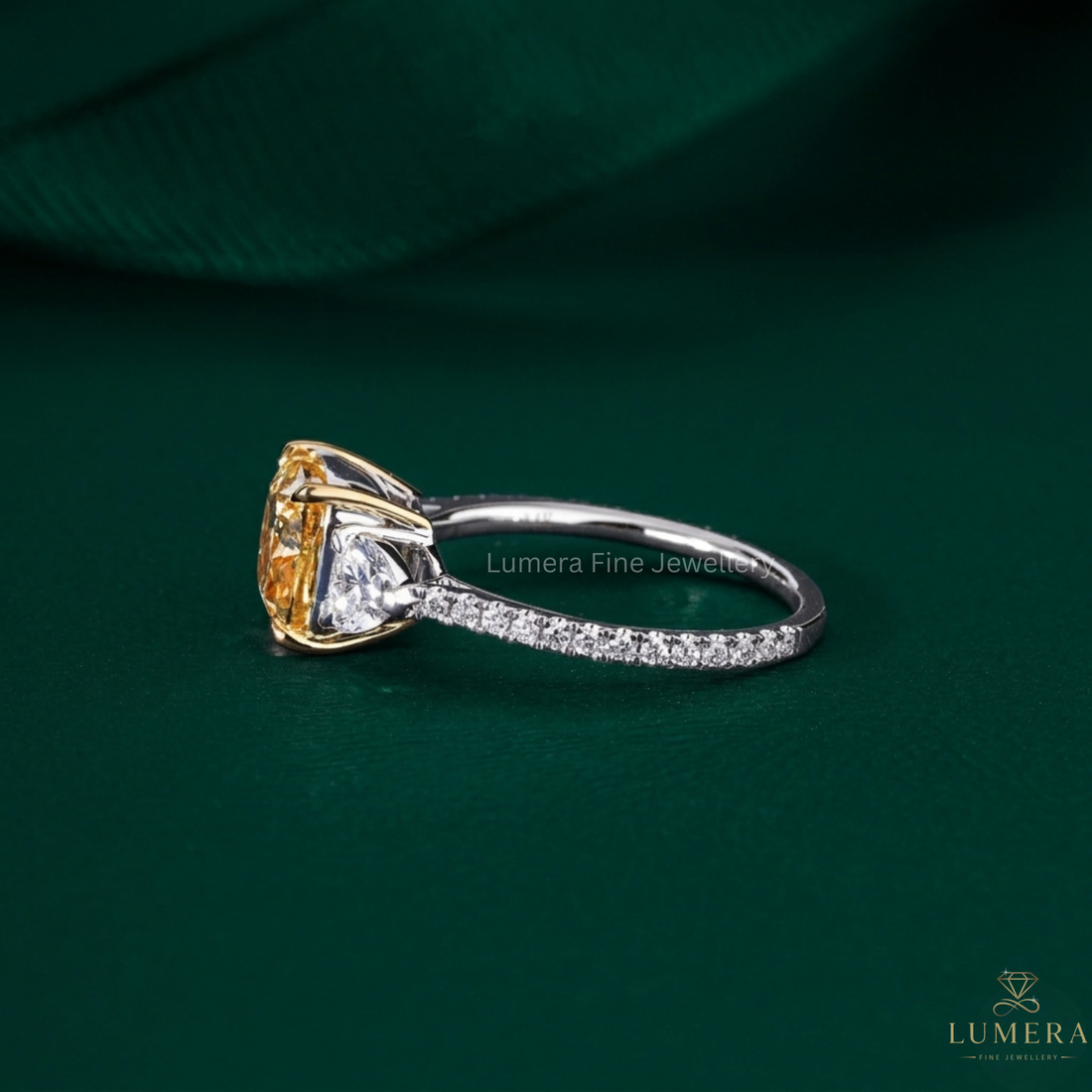 yellow diamond ring with cushion ring.
