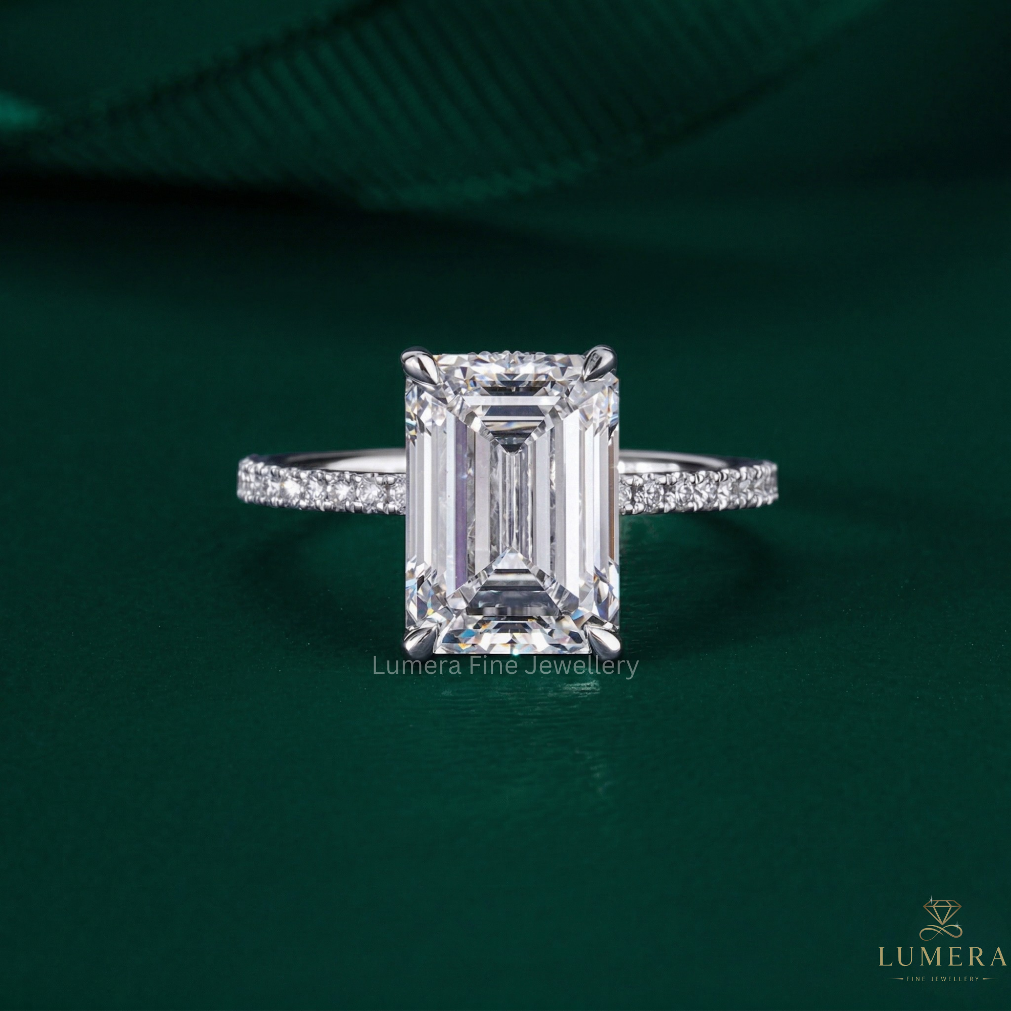 Emerald diamond engagement ring with Emerald engagement ring.