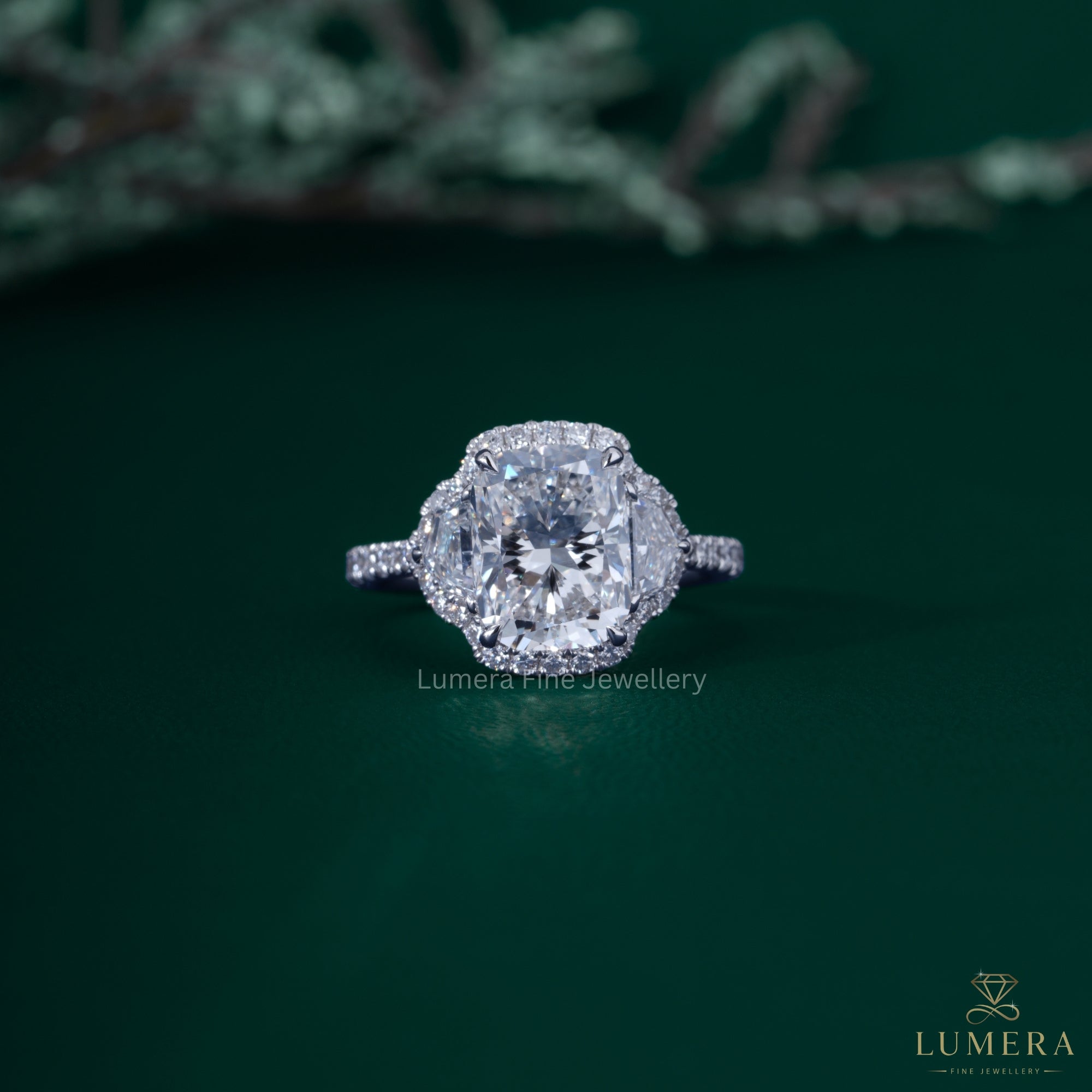 Elongated cushion cut engagement ring with Three stone cushion cut ring.
