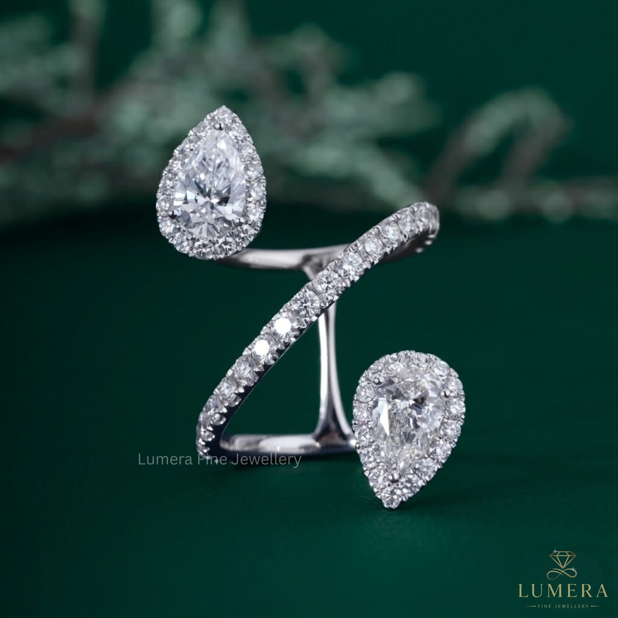 Two stone halo ring with Pear halo ring.