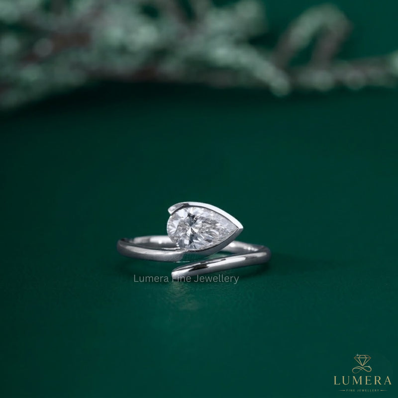 Solitaire engagement ring with Pear solitaire ring.