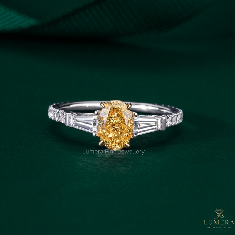 Yellow Diamond Three Stone Ring with oval diamond engagement ring.