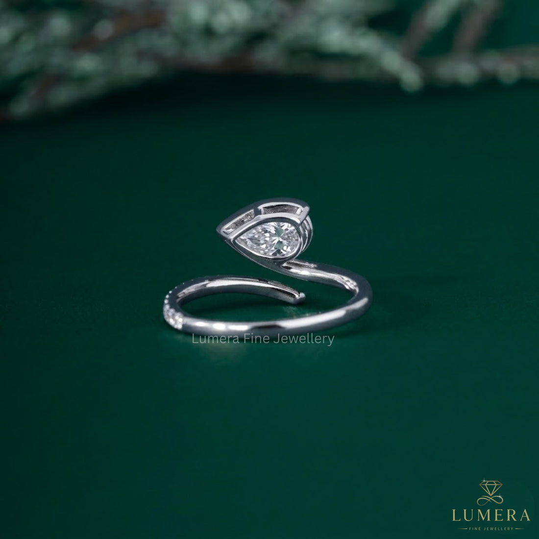 Pear diamond engagement ring with Almond engagement ring.