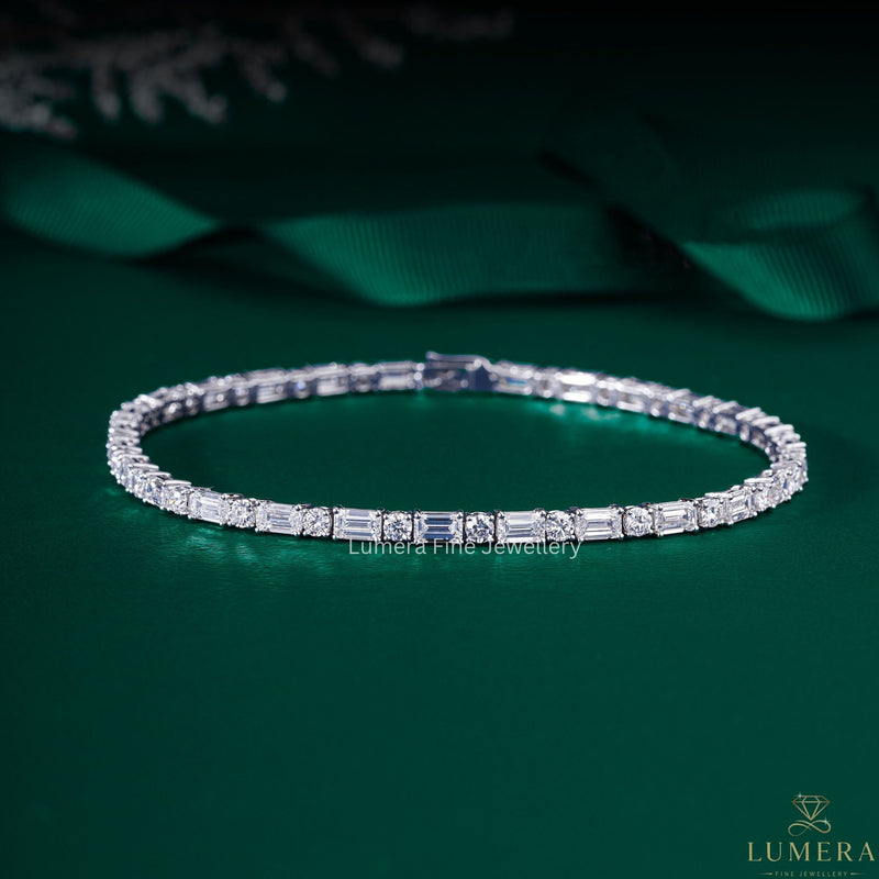 east west emerald and round tennis bracelet with lab diamond tennis bracelet.