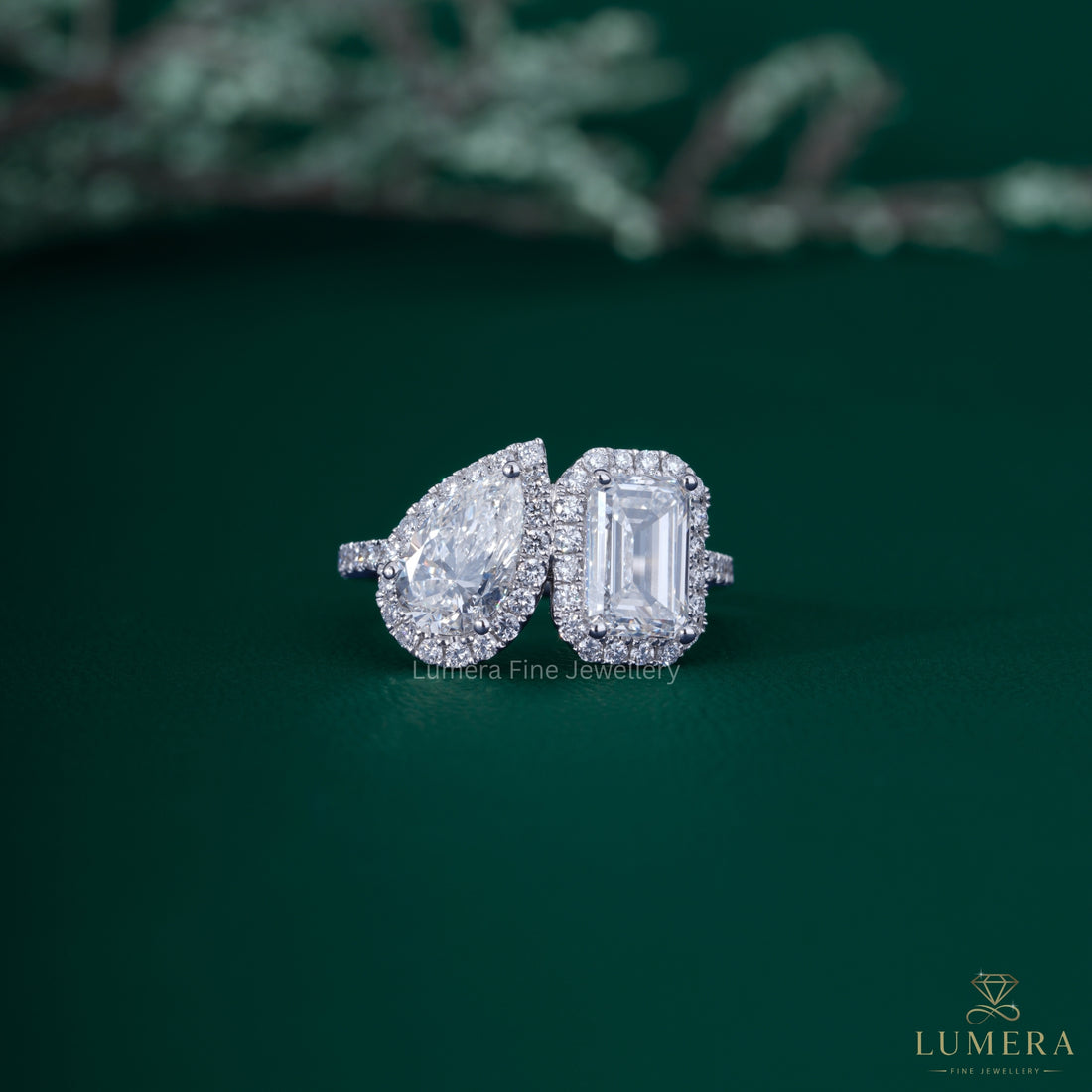 Pear and emerald diamond ring with pear diamond ring.