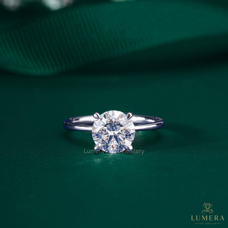 round solitaire engagement ring with tapered shank ring