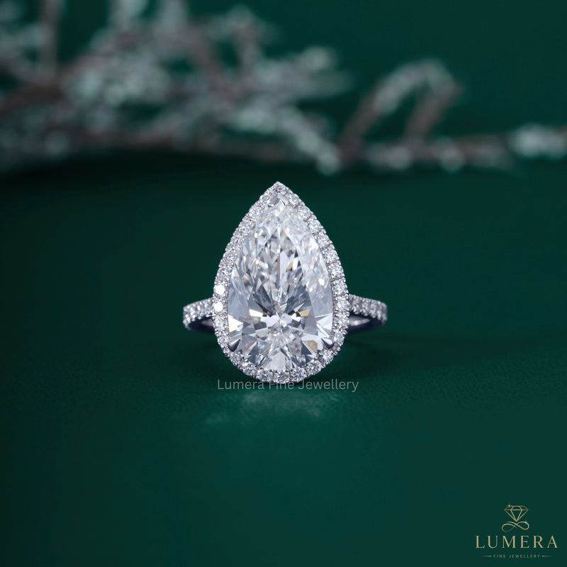 Pear shaped ring with pear shaped engagement ring.