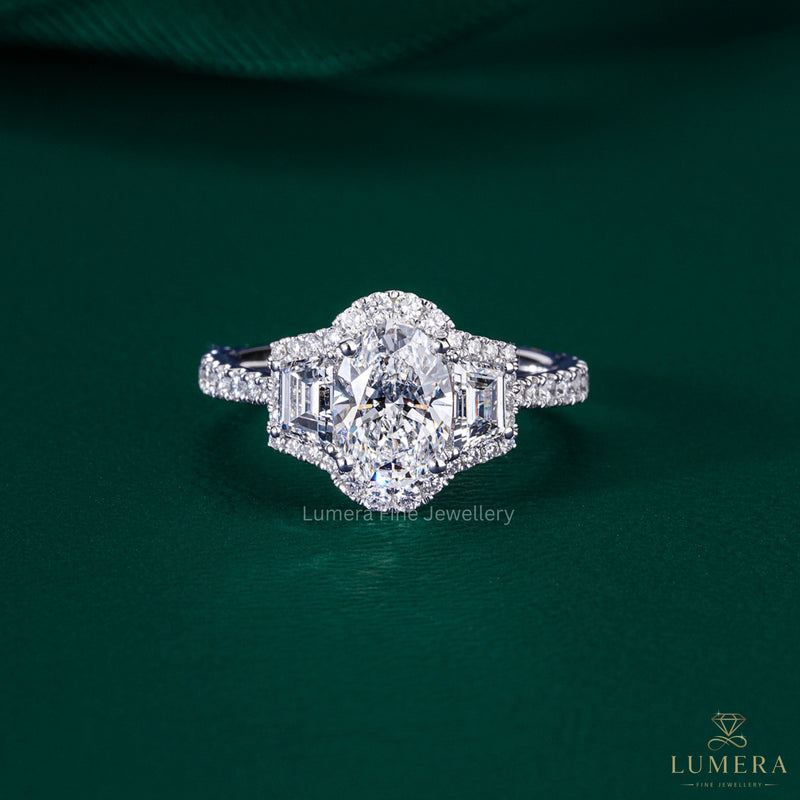 Oval Diamond Ring With Trapezoid Side Stone
