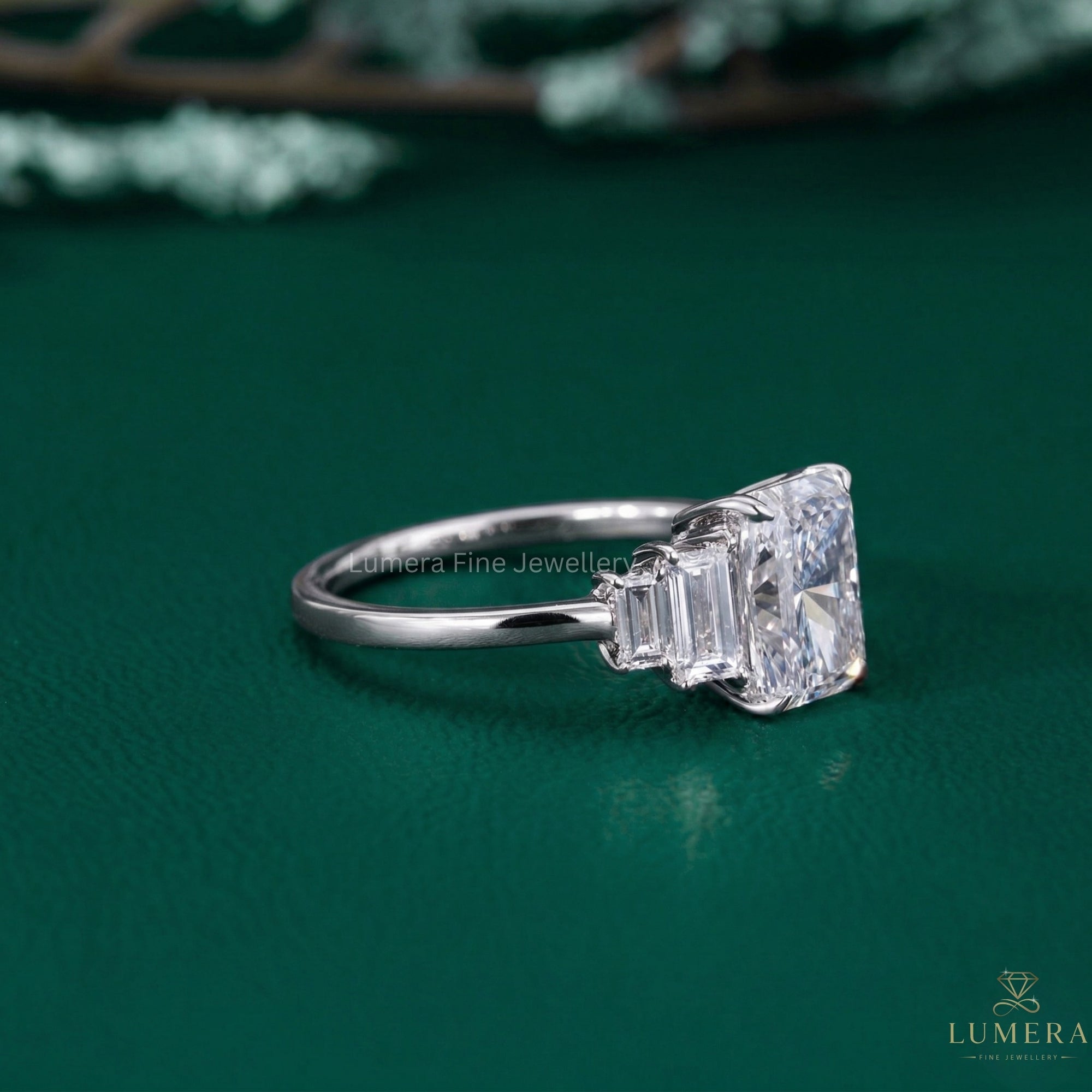 five stone diamond ring with radiant engagement ring.