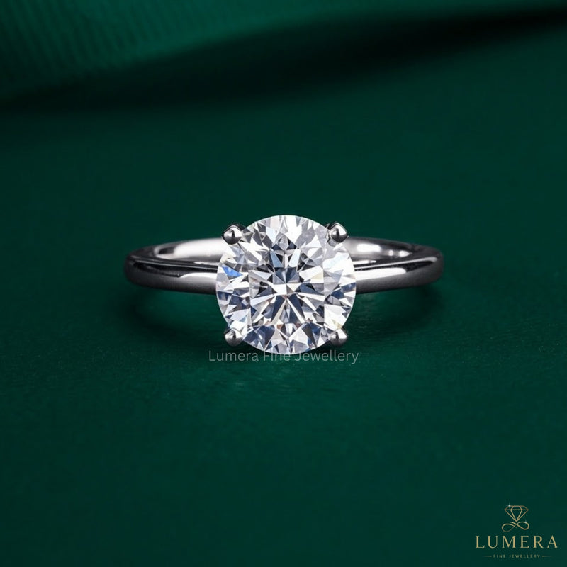solitaire engagement ring with cathedral setting ring.
