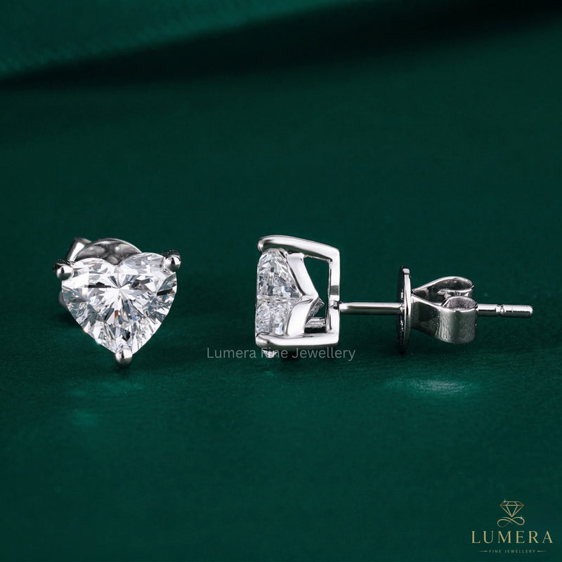 heart diamond stud earrings with heart shape earrings.
