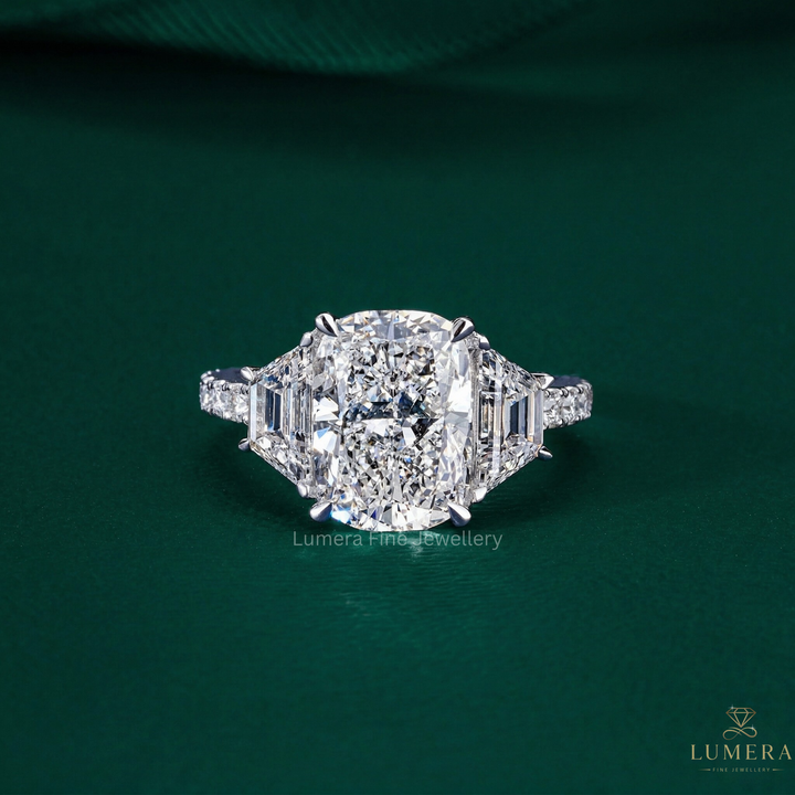 Cushion Cut Engagement Ring with trapezoid side stone.
