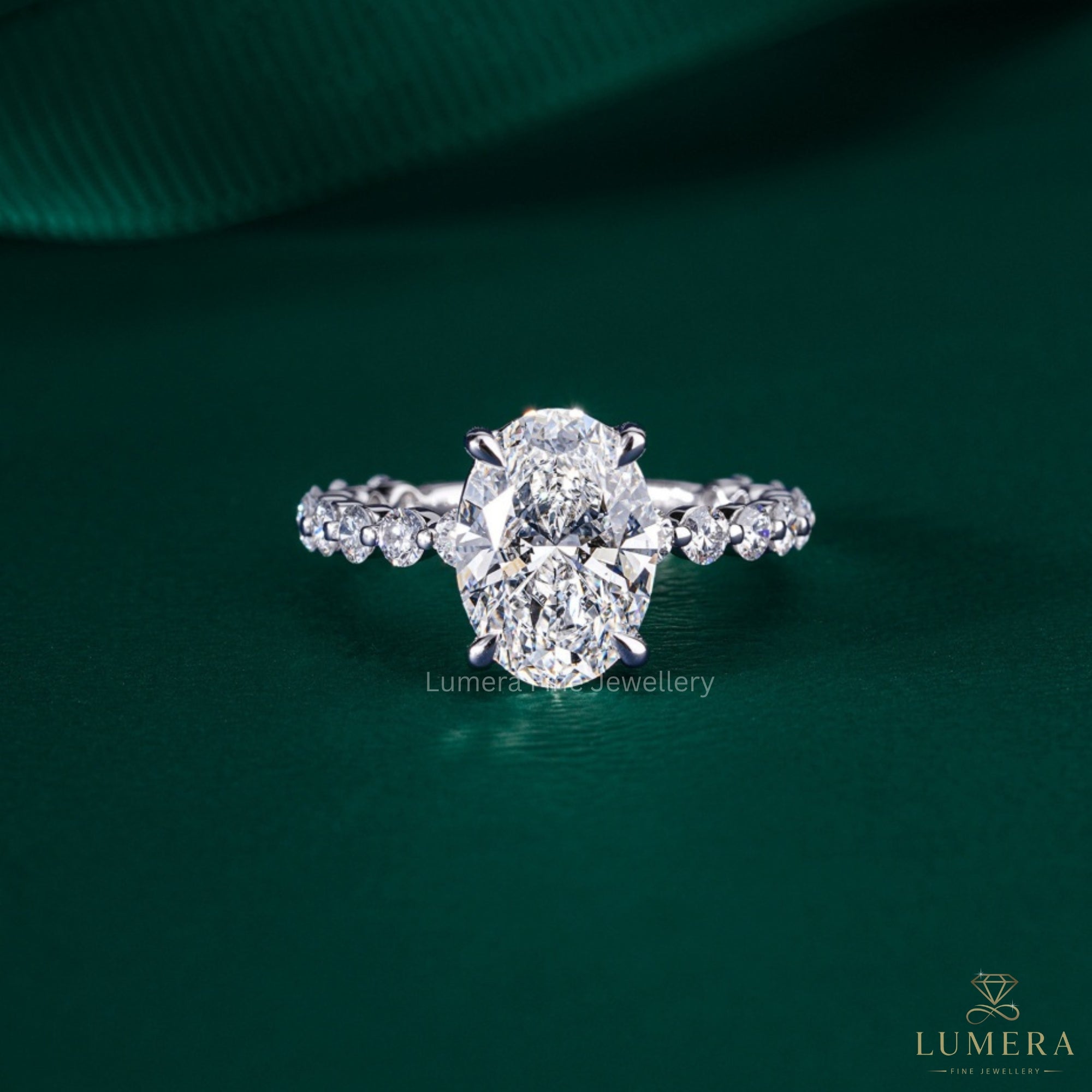 oval lab grown diamond engagement ring with stackable pave setting.