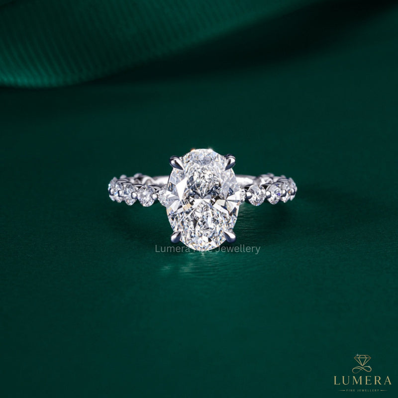 oval lab grown diamond engagement ring with stackable pave setting.