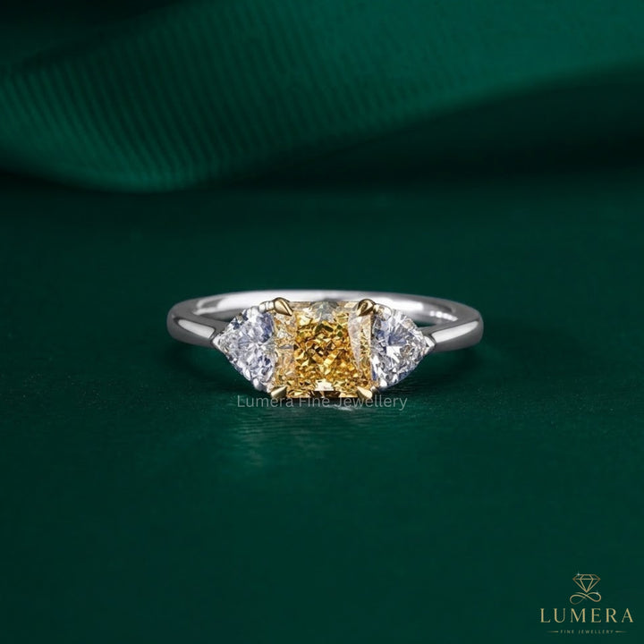 yellow diamond engagement ring with radiant diamond ring.
