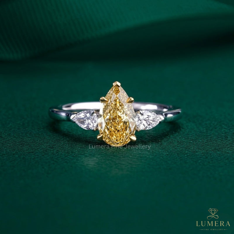 three stone engagement ring with claw and V prong setting.