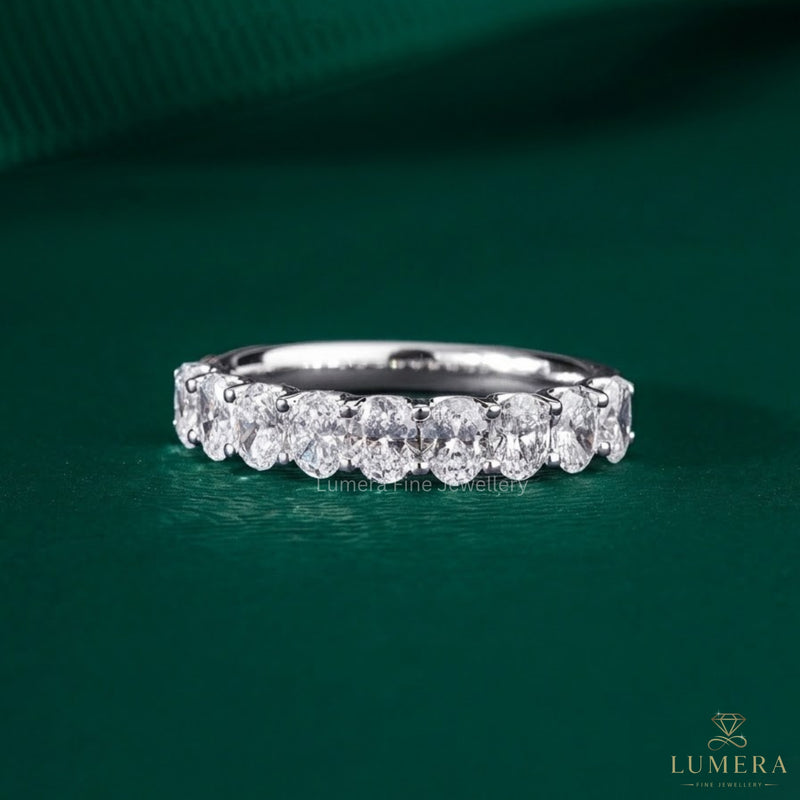 oval cut half eternity band with oval diamond wedding band.
