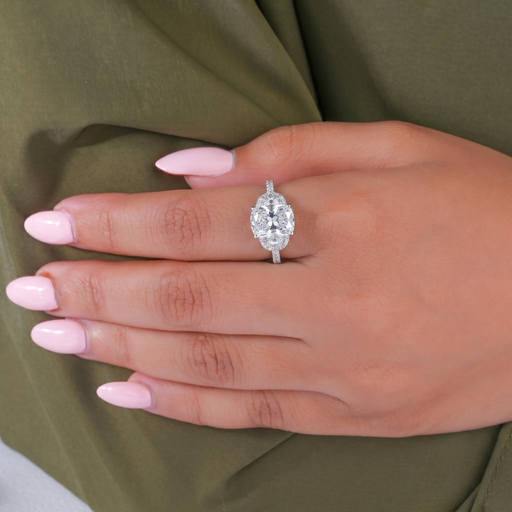pave diamond ring with claw prong setting ring.
