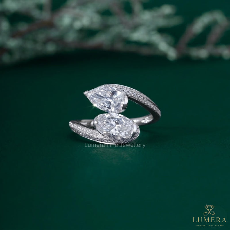 Pear And Oval Engagement Ring In Knife Edge Shank Setting