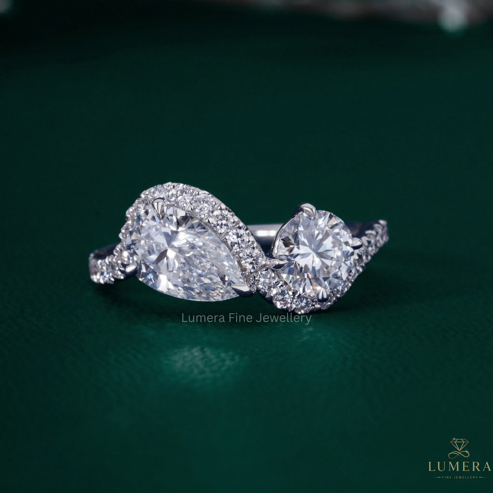 Pear and round engagement ring with Pear round ring.