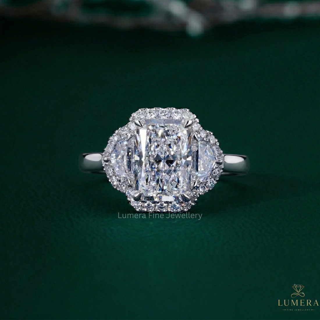 radiant diamond engagement ring with radiant Cadillac side stone.