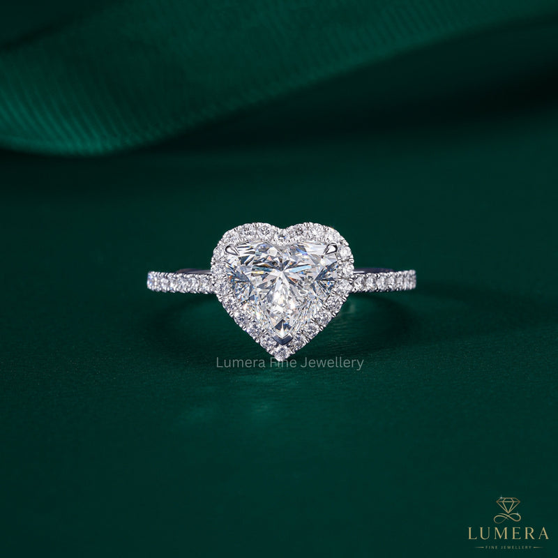 heart diamond engagement ring with cathedral setting ring.