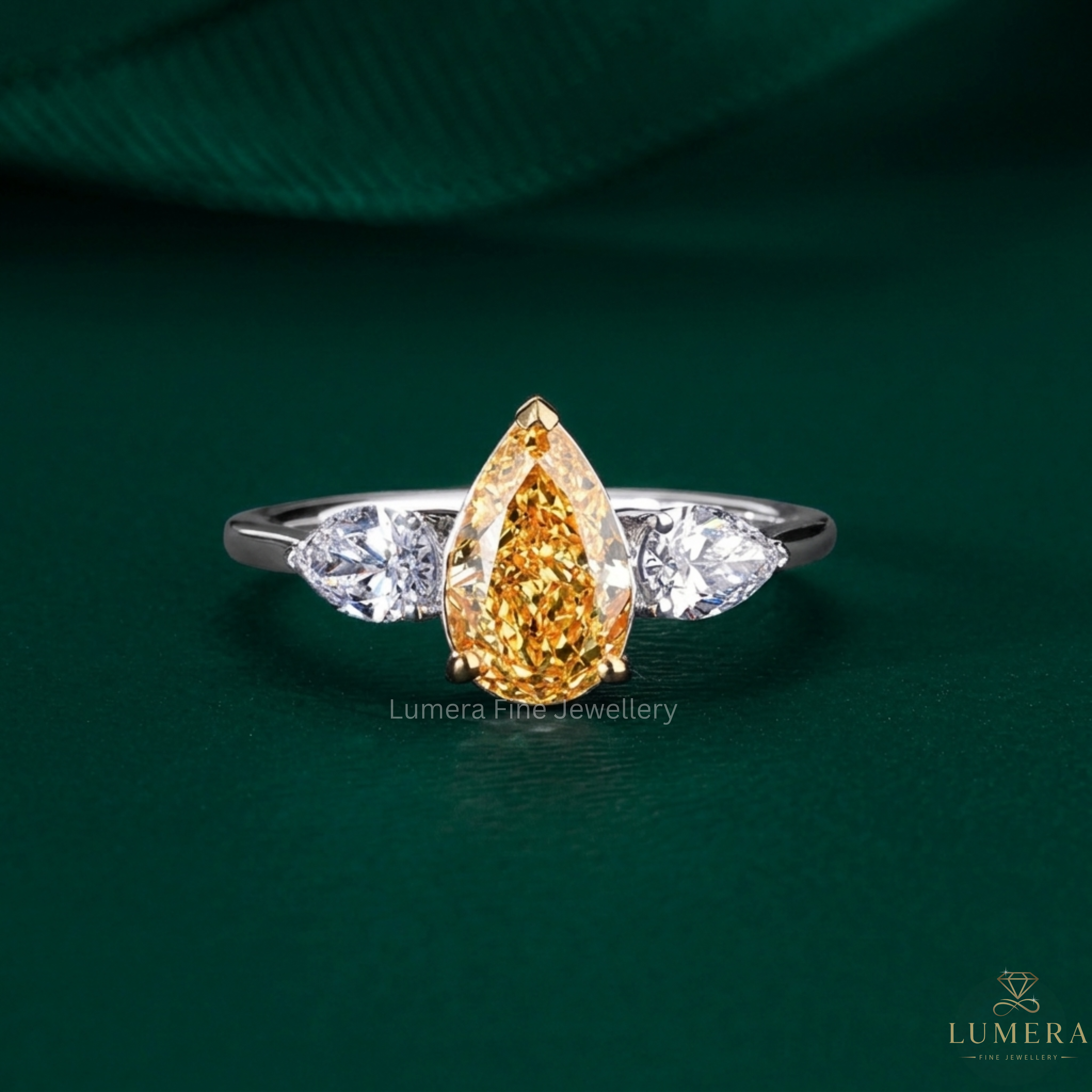 Yellow pear engagement ring with Pear shaped engagement ring.
