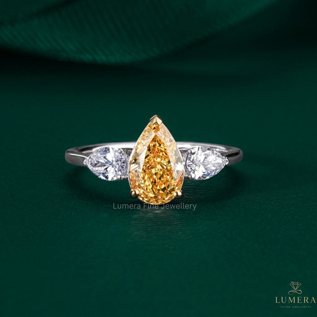 Yellow pear engagement ring with Pear shaped engagement ring.