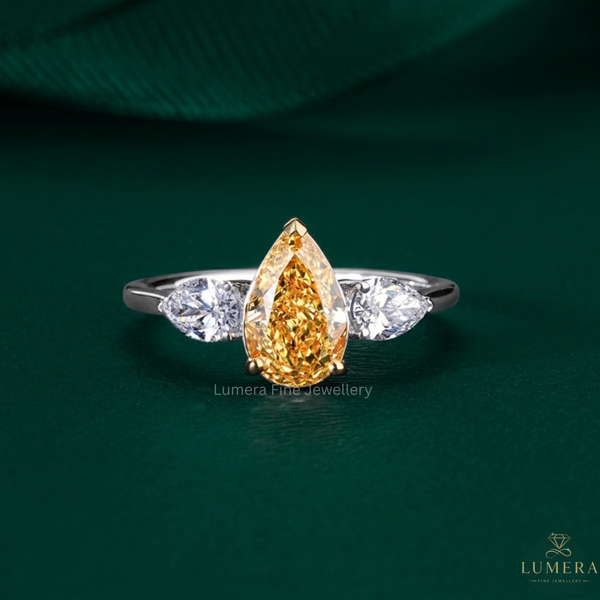 Yellow pear engagement ring with Pear shaped engagement ring.