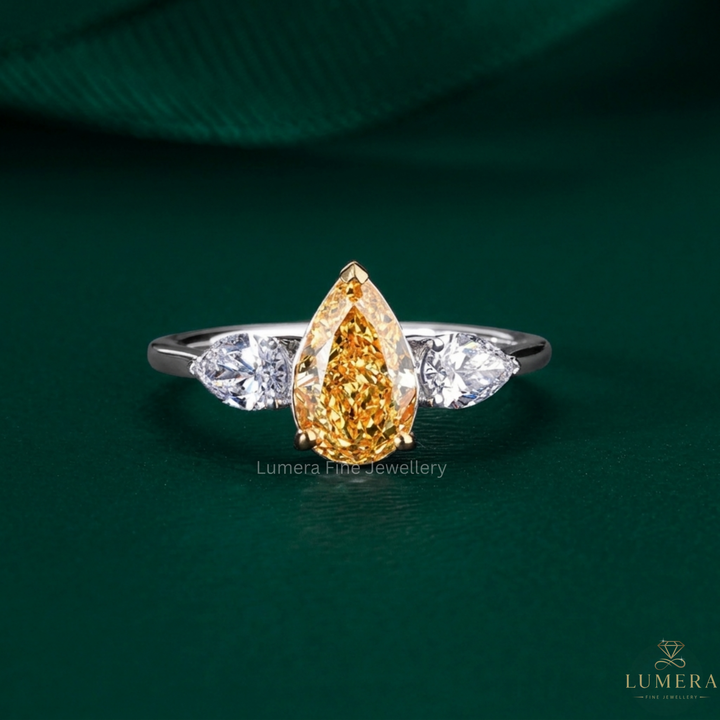 Yellow pear engagement ring with Pear shaped engagement ring.