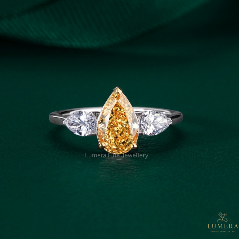 Yellow pear engagement ring with Pear shaped engagement ring.