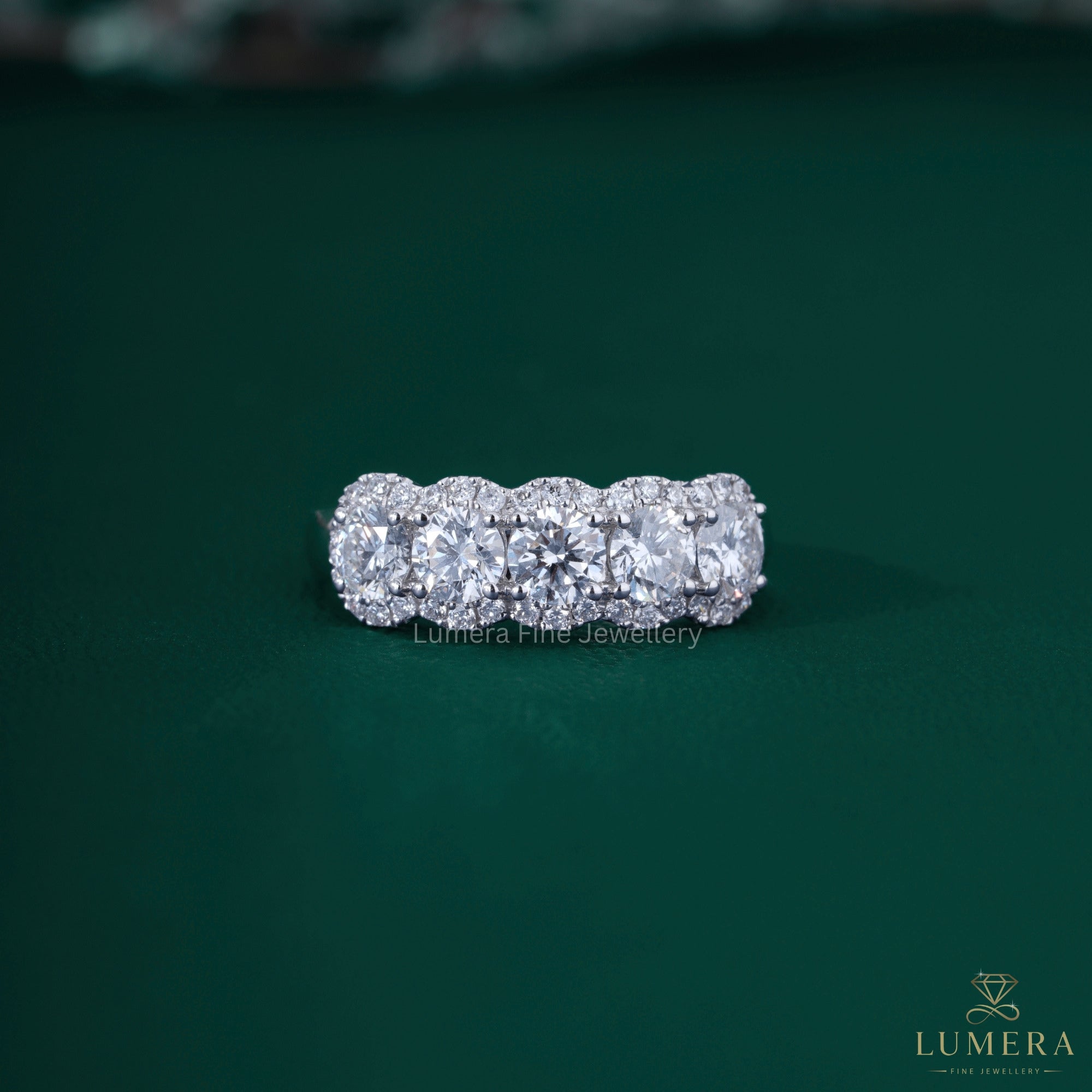 Round diamond wedding band with five stone wedding band.