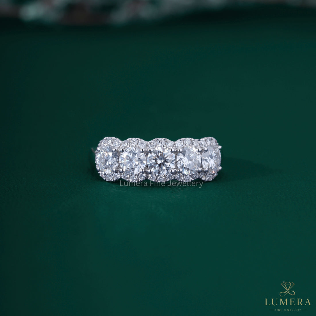 Round diamond wedding band with five stone wedding band.